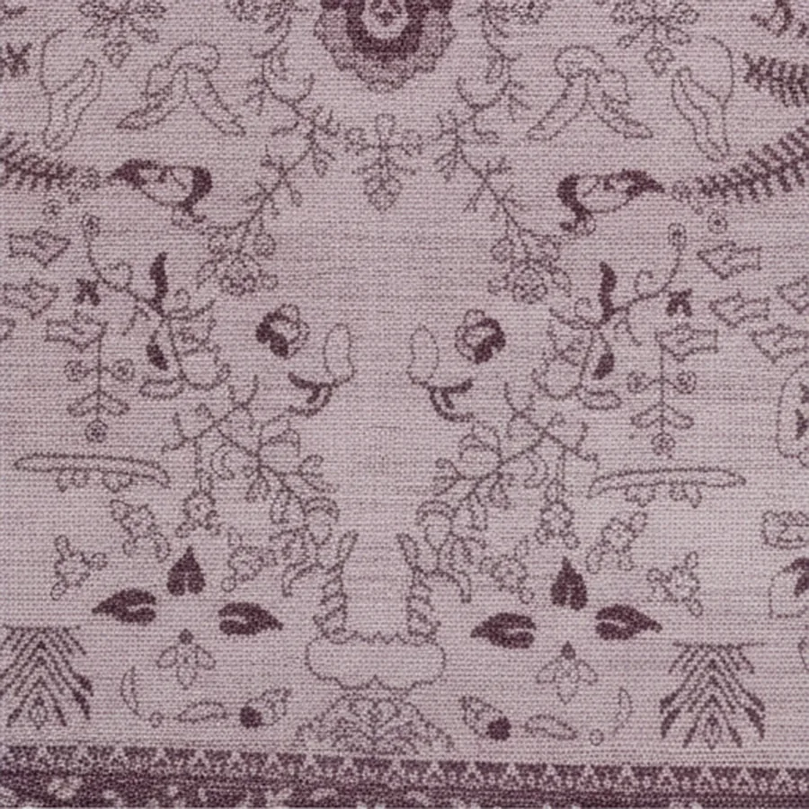 Close-up of the woven pattern and border.